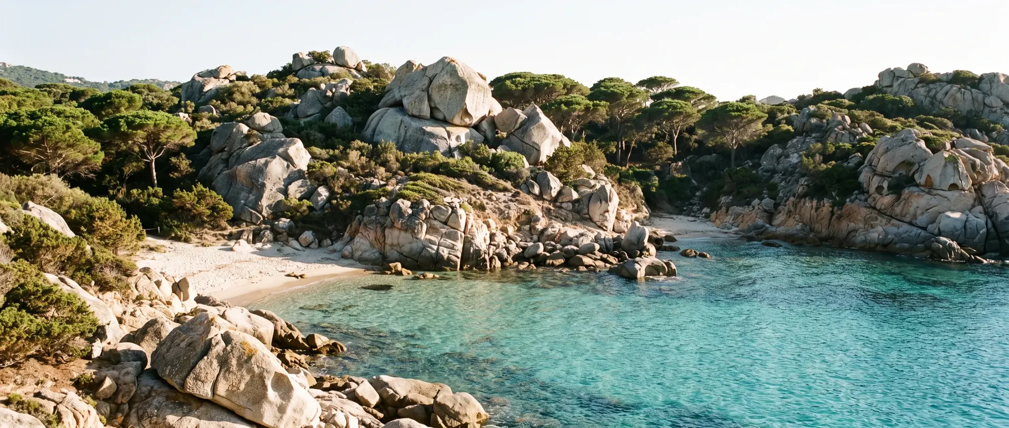 Granite boulders and small sandy inlets at Cap Camarat on the Saint-Tropez peninsula.