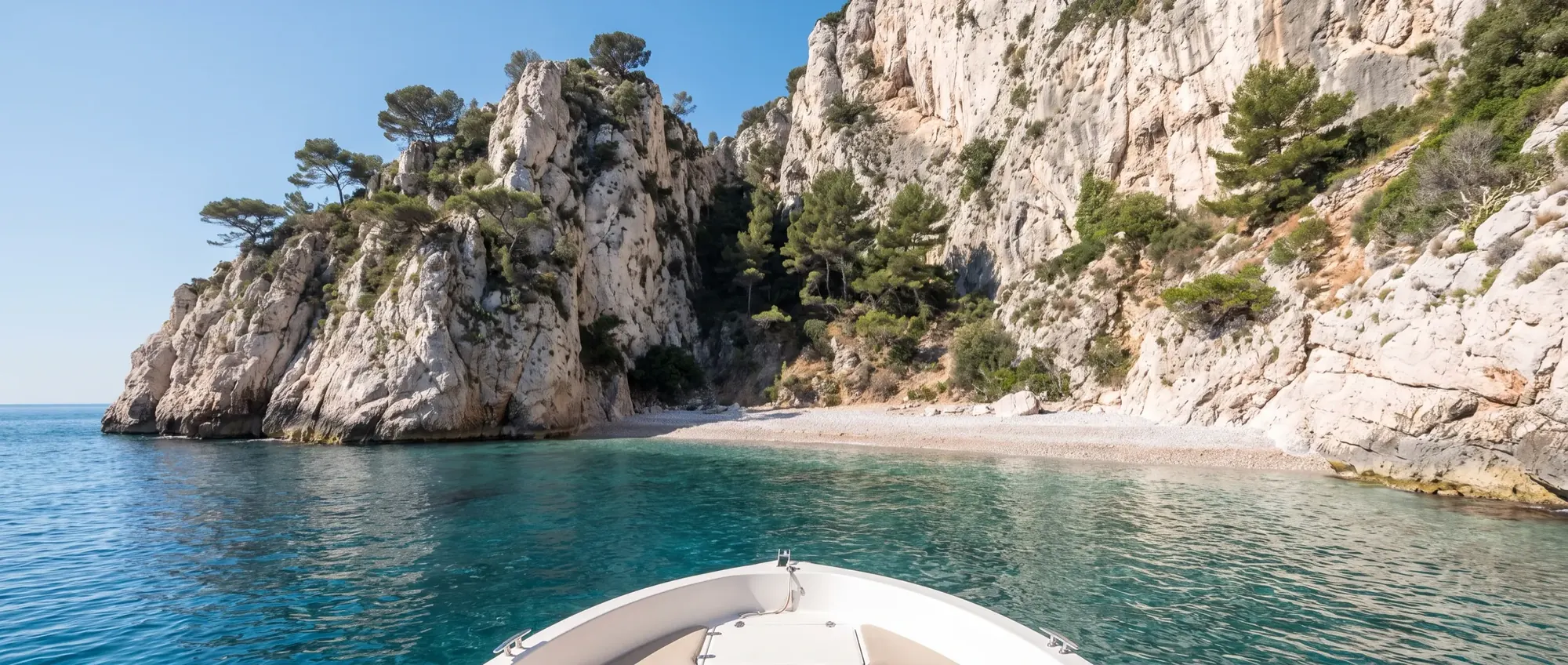 A cliff-backed cove near Cap d’Ail with water the colour of a swimming pool.