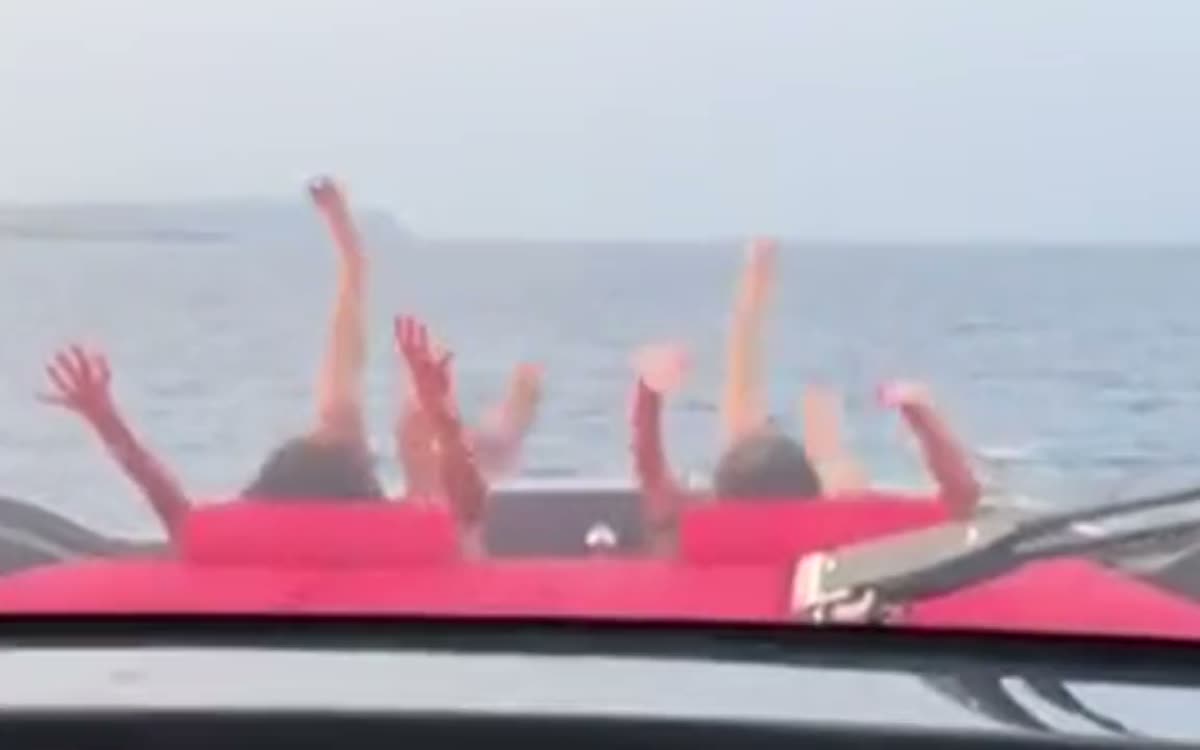 Arriving at a beach club by tender in the late afternoon.